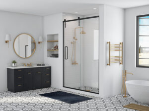 Modern bathroom with black vanity, round mirror, glass shower, and freestanding tub. Patterned floor tiles and gold fixtures enhance the contemporary design.