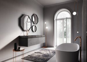 A modern bathroom features geometric mirrors, standalone bathtub, and floor-to-ceiling window with garden view, emphasizing minimalistic design and natural light.