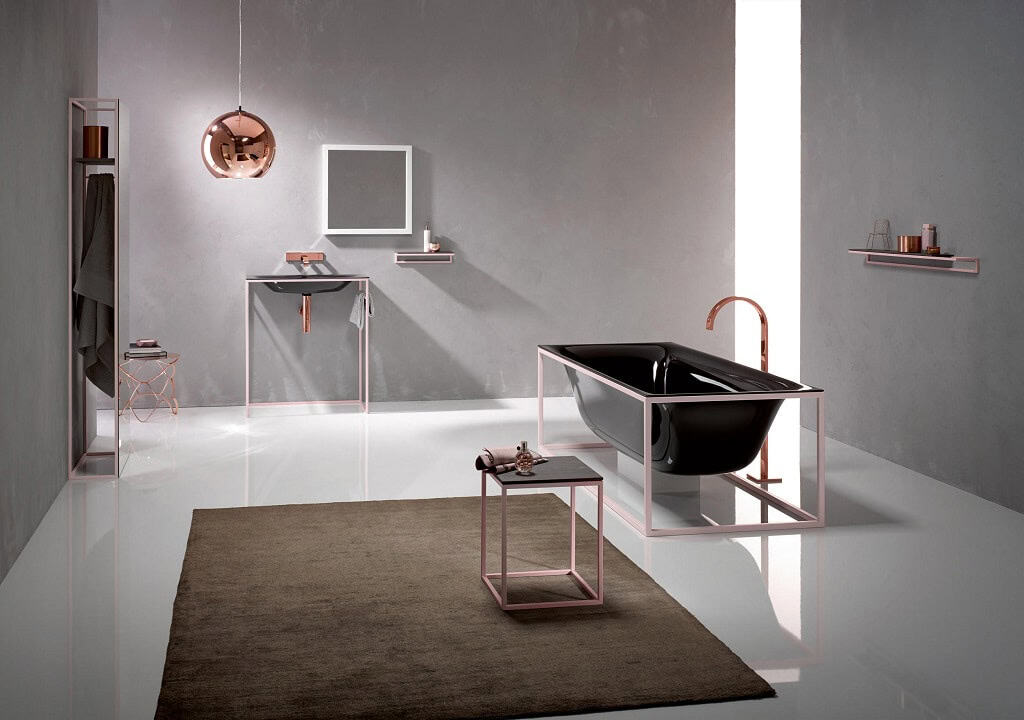 Modern bathroom with black tub, copper fixtures, and minimalist design. Open shelving, geometric lines, soft lighting, and a reflective copper pendant lamp.