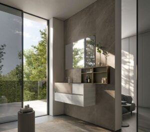 Modern bathroom with large window, gray walls, floating vanity, and small plants. Outside, a lush green view enhances the spacious, minimalistic design.