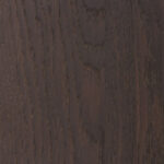 Close-up of a dark brown wood texture with visible grain patterns. The image features a natural, earthy appearance and subtle surface details.