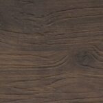 This is a close-up image of a wooden texture featuring dark brown tones with visible grain patterns and subtle variations in shading.