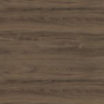 Wooden surface with a natural brown texture, displaying grain patterns. The image shows a close-up of wood, possibly used for flooring or furniture.