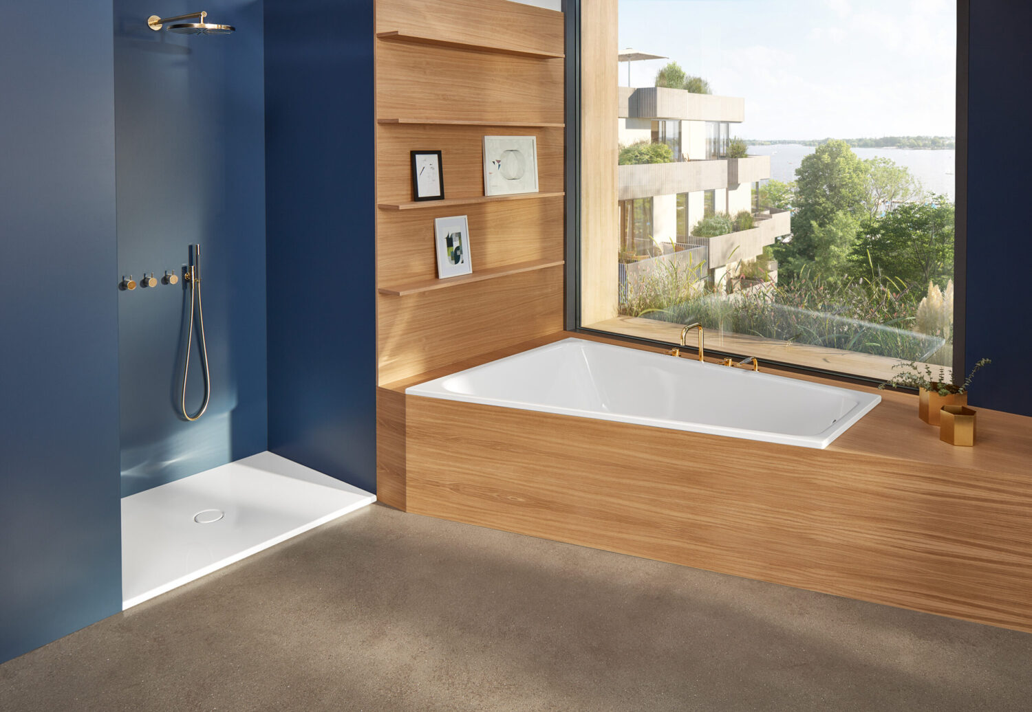 Modern bathroom with blue and wood accents, featuring a spacious shower and bathtub. Large window offers views of greenery and buildings.