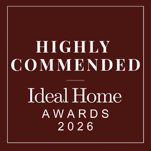 Highly Commended Ideal Home Awards 2026 badge with maroon background and white text.
