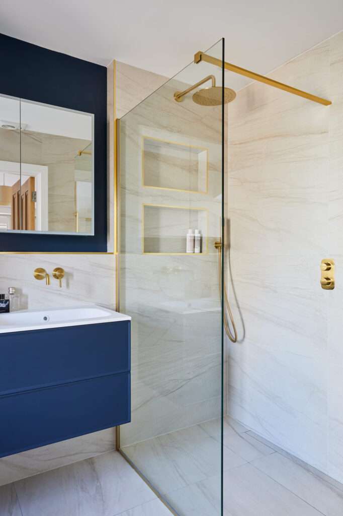 blue and gold bathroom renovation central london