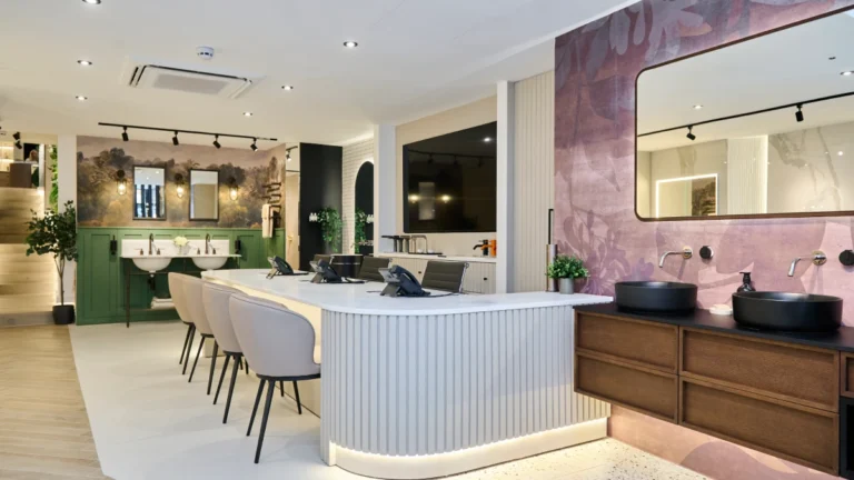 Modern bathroom showroom with stylish sinks and elegant decor.