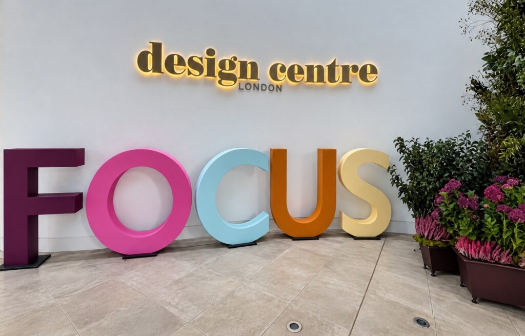 Colourful 'FOCUS' sign outside Design Centre London for bathroom design ideas.