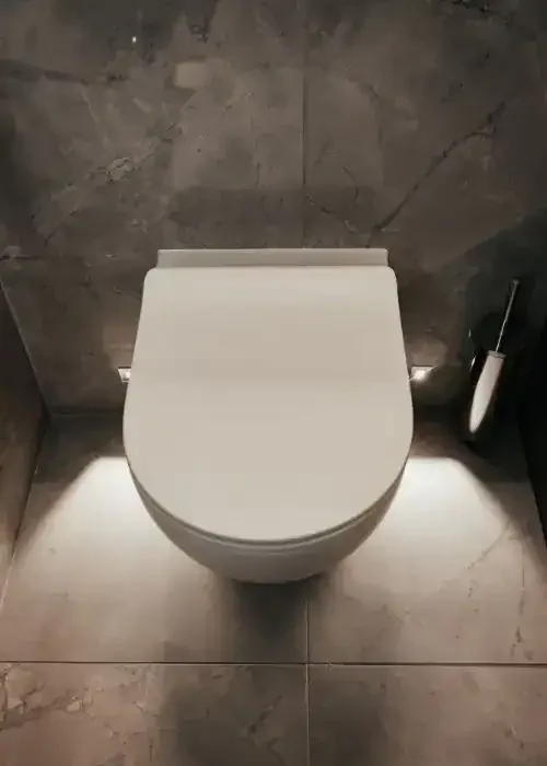 Wall-mounted toilet, modern bathroom, sleek design, Kallums Bathrooms, WC, contemporary style.