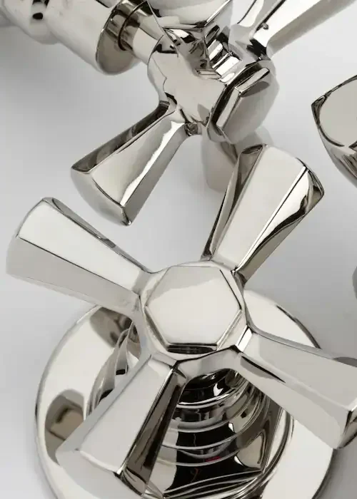 Chrome bathroom tap with sleek, contemporary design.