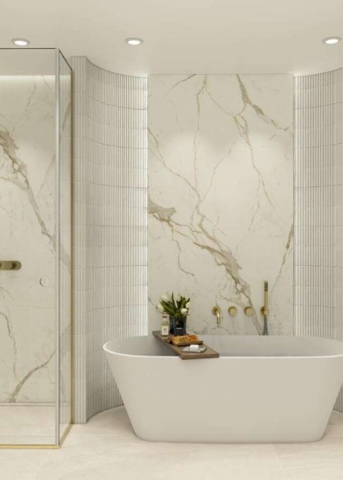 Luxurious bathroom with marble walls, glass shower, and freestanding tub. Modern fixtures and soft lighting create an elegant, serene atmosphere.