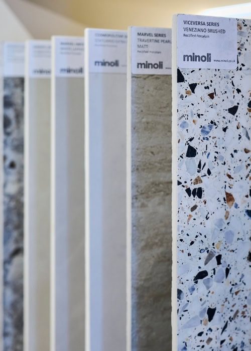 Variety of terrazzo and stone bathroom surface samples from Minoli.