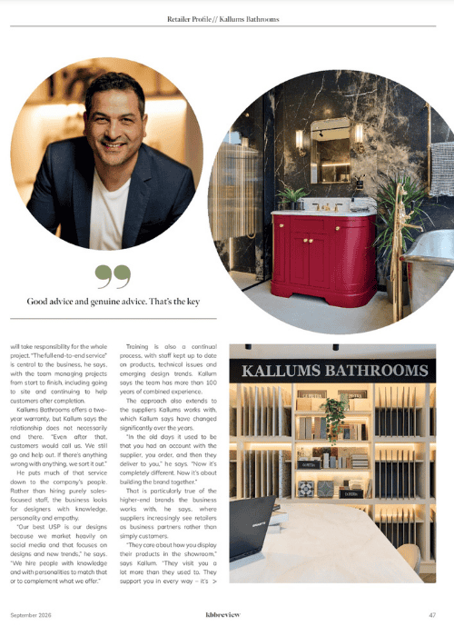 Modern bathroom with a red vanity unit and marble walls, featured in Kallums Bathrooms review.